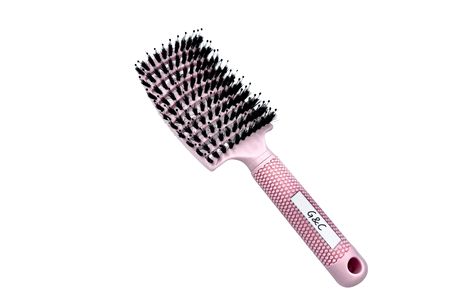 Pink hairbrush with black bristles on a white background gold class g&c