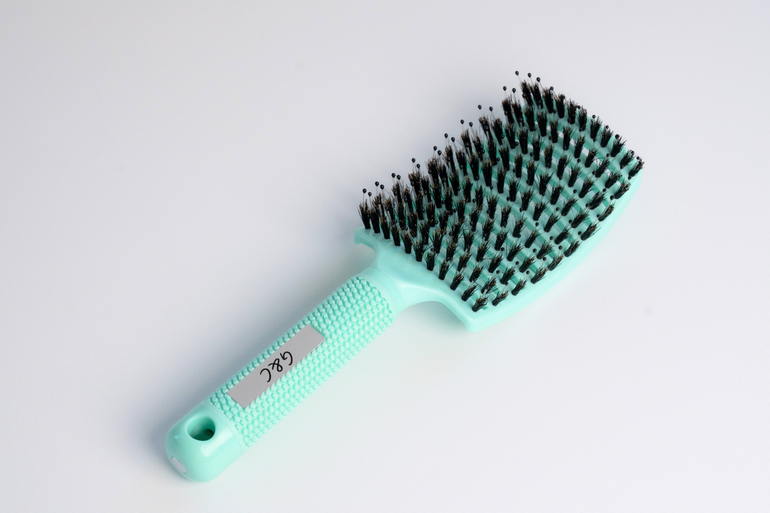 gc-gold-class-detangling-brush-green-side